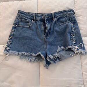 PacSun Distressed Lace-Up High-Rise Denim Shorts in Medium Blue